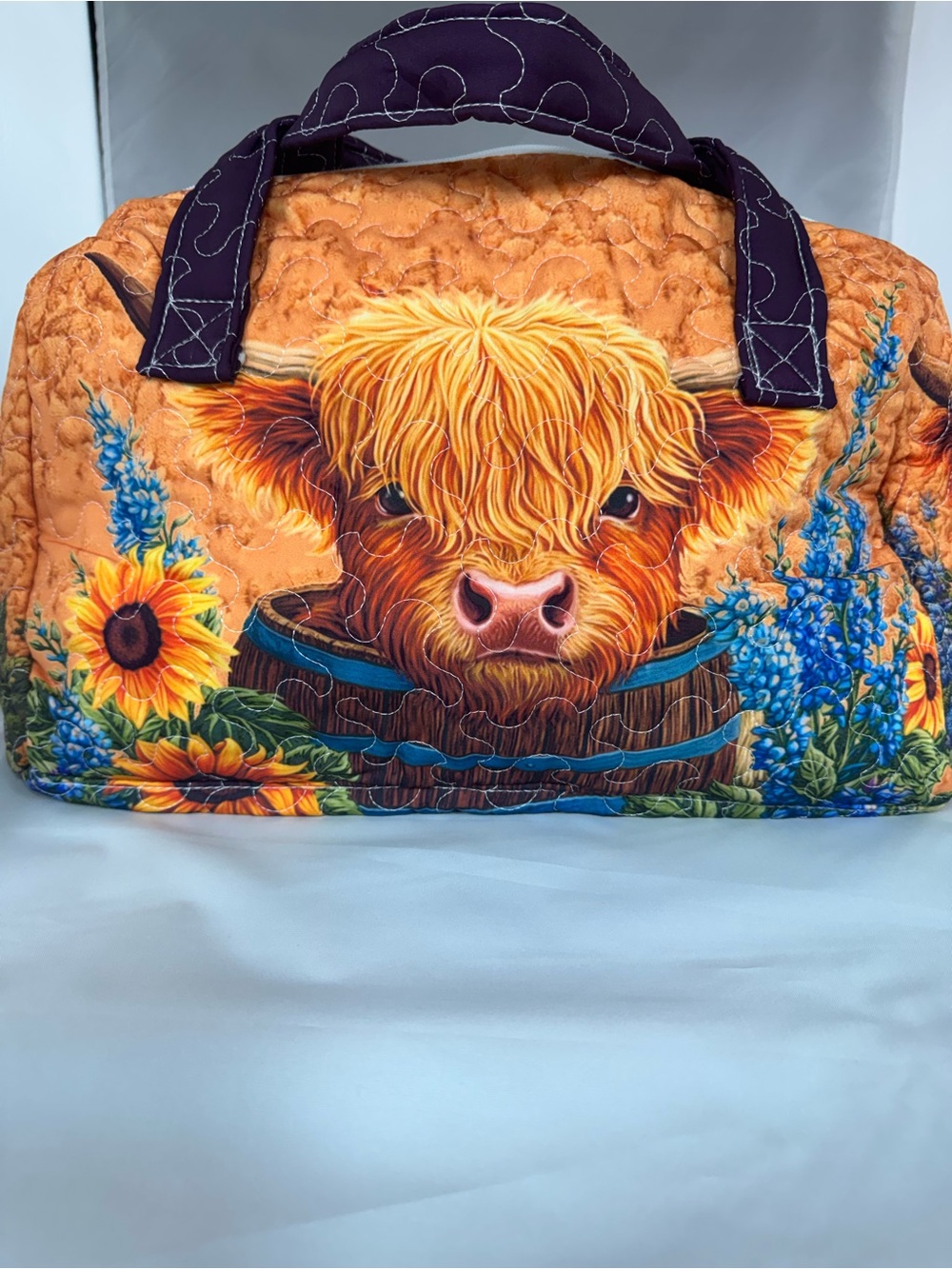 Quilted Cow Print Weekender Bag in Orange and Purple